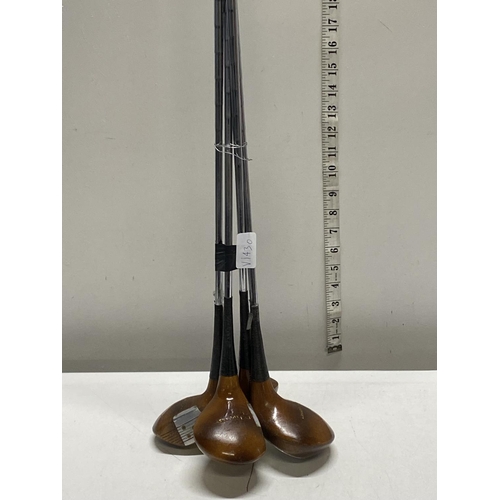 451 - Four vintage wooden golf clubs, shipping unavailable