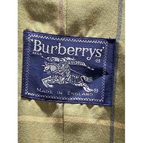 466 - A vintage Burberry (Burberrys) long trench coat size 10