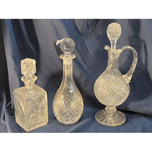 12 - Three assorted cut glass decanters, shipping unavailable