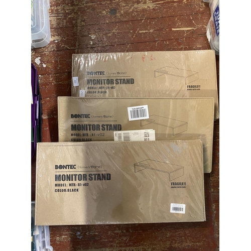 164 - Three new boxed monitor stands