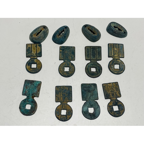 149 - A collection of Chinese bronze coins & tokens