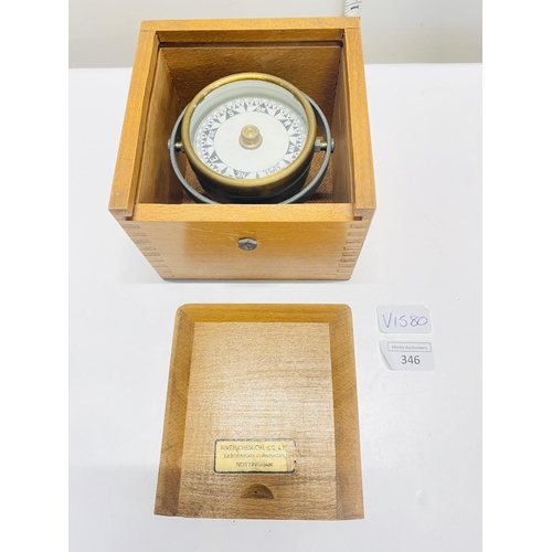 146 - A boxed ships gimbal compass