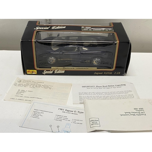 121 - A boxed limited edition Maisto die-cast E type Jaguar model