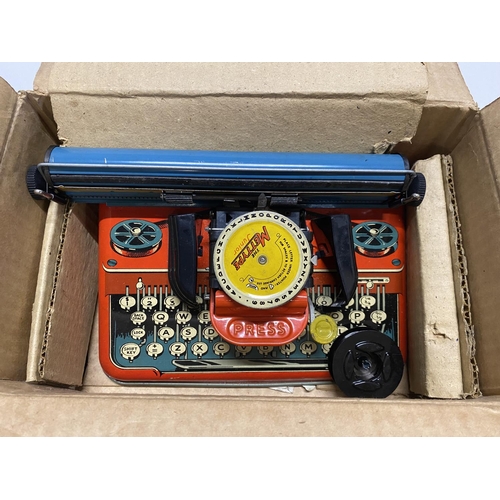 126 - A vintage Met Type Junior typewriter in original box