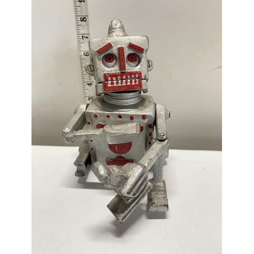 131 - A vintage cast alloy Hubley money box