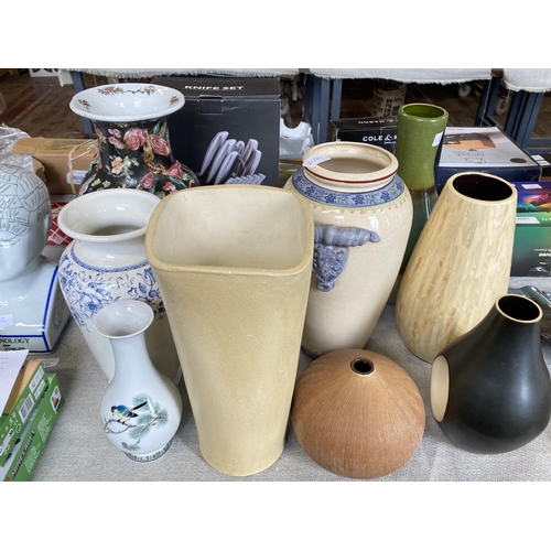 151 - A large selection of assorted ceramic vases, shipping unavailable