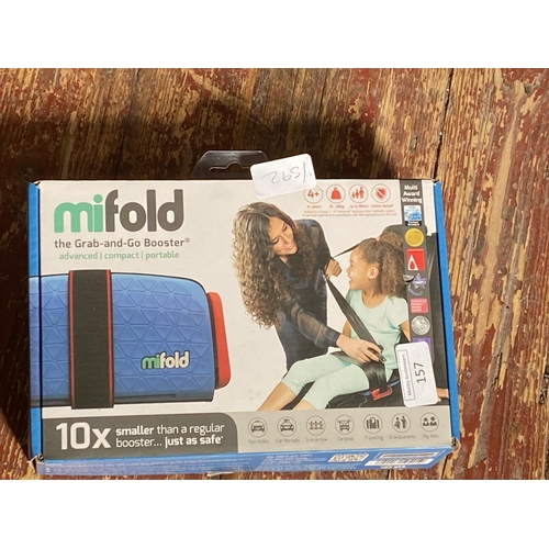 157 - A boxed Mifold booster seat