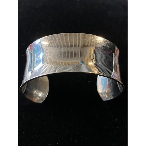 171 - A stamped 925 silver torque bangle
