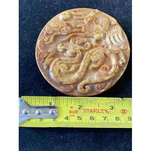 176 - A hand carved Chinese amulet?