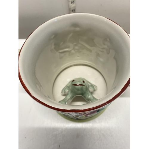 312 - A 19th century Staffordshire double handled Frog mug