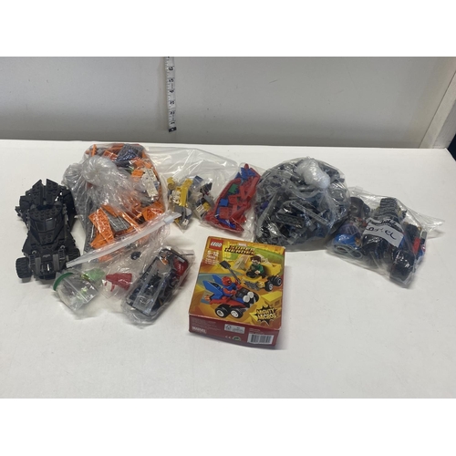 12 - A selection of assorted Lego including Batman and Spiderman