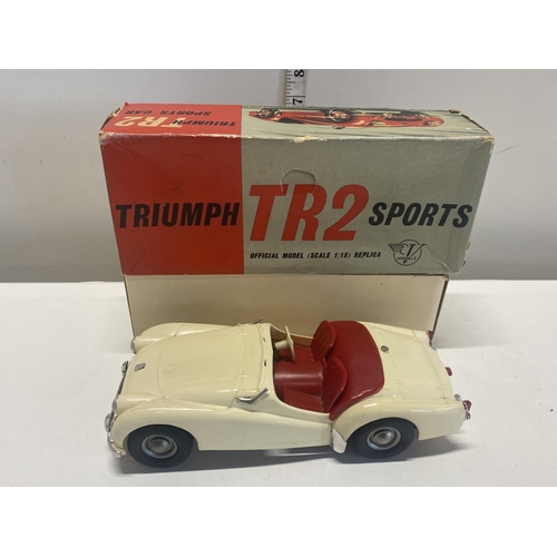 13 - A boxed vintage Triumph TR2 sports car model