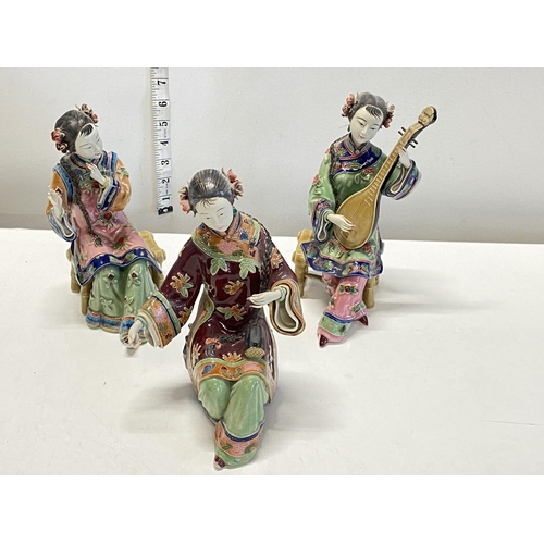 144 - Three ceramic oriental figures (damaged), signed to the base, shipping unavailable