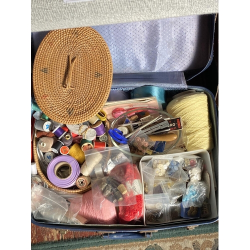 162 - A vintage suitcase full of assorted sewing and knitting accessories etc.  no shipping