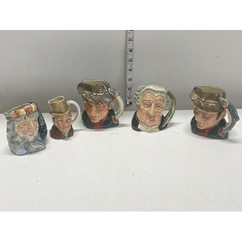 204 - A selection of small Royal Doulton toby jugs and one other, shipping unavailable