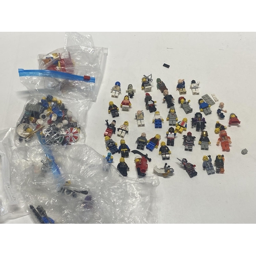 21 - A selection of assorted vintage Lego figures etc.