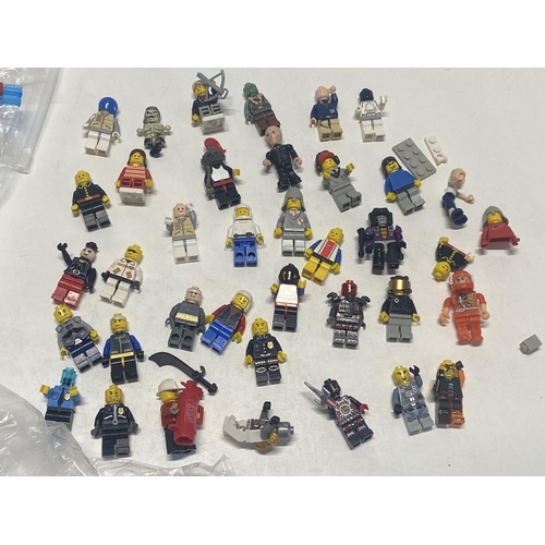 21 - A selection of assorted vintage Lego figures etc.