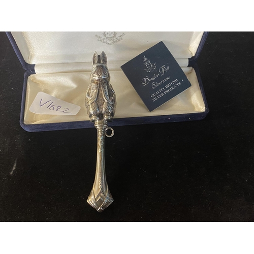 235 - A boxed hallmarked silver Peter Rabbit babies rattle