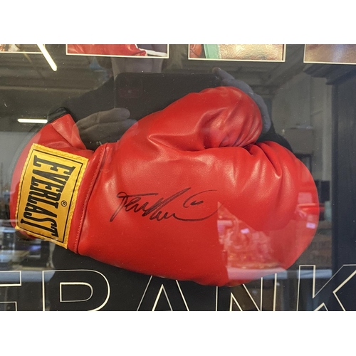 64 - A signed Frank Bruno boxing glove in glazed display case.  shipping unavailable