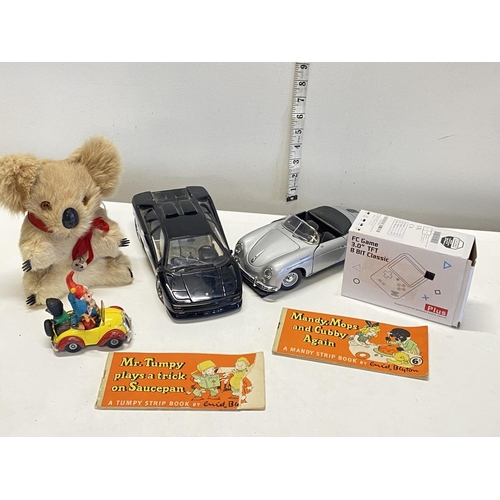 67 - A selection of assorted collectibles including a Noddy car.