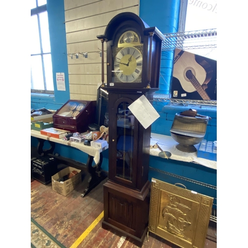 87 - A 1990's Jaycee long case clock in a oak case. With weights and pendulum.  no shipping