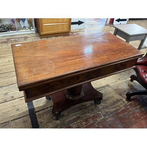 87A - A early Victorian swivel  & flip top table with storage under. Open size : 102cm x 100cm x 75cm tall... 