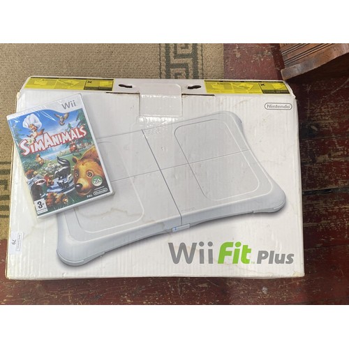 79 - A Wii Fit board & game.  no shipping