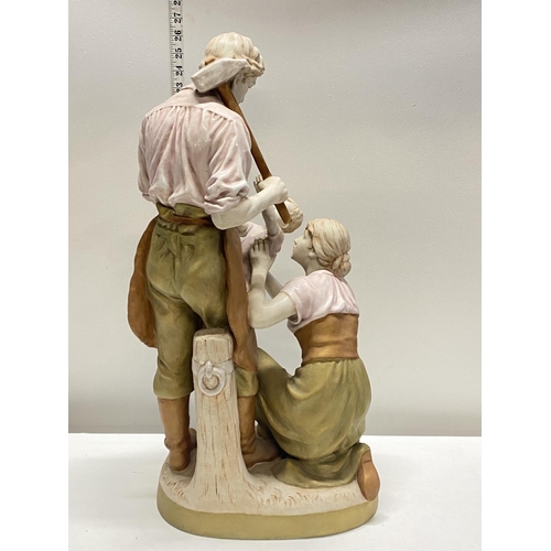 2 - A large Royal Dux figural group model number 11559 'The Blacksmith Family' (crack to rear of base, p... 