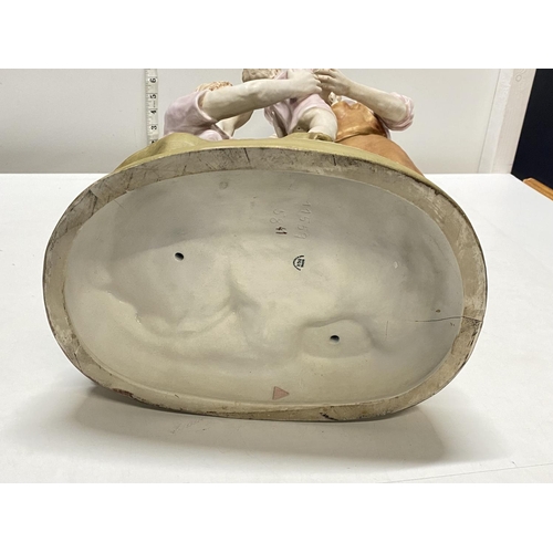 2 - A large Royal Dux figural group model number 11559 'The Blacksmith Family' (crack to rear of base, p... 