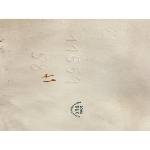 2 - A large Royal Dux figural group model number 11559 'The Blacksmith Family' (crack to rear of base, p... 