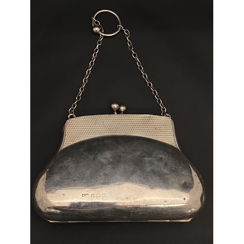 107 - A hallmarked silver ladies evening purse with monogram and inscription for 1945