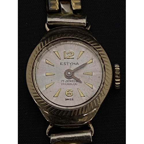 141K - A vintage ladies Estyma 9ct gold bodied cocktail watch