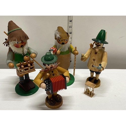 38 - A selection of wooden  German folk figures, shipping unavailable