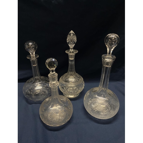 47 - Four cut glass decanters, shipping unavailable