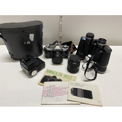 7 - A Minolta XG2 camera and accessories with a pair of cased binoculars (untested), shipping unavailabl... 