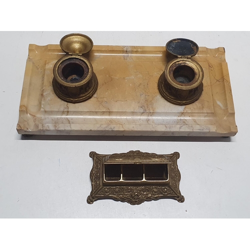 11 - A antique ink well with marble base and a brass stamp holder, shipping unavailable