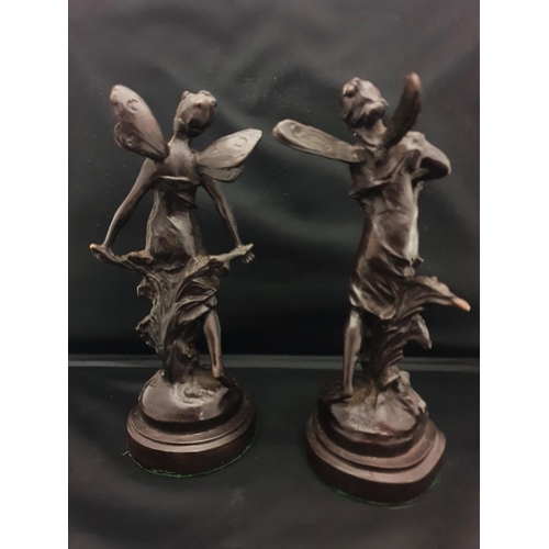 47 - A pair of bronze fairies h21cm