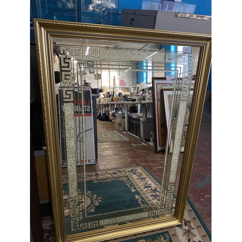 336 - A large gilt framed contemporary mirror 100x70cm and a Edwardian mahogany framed bevelled edge mirro... 