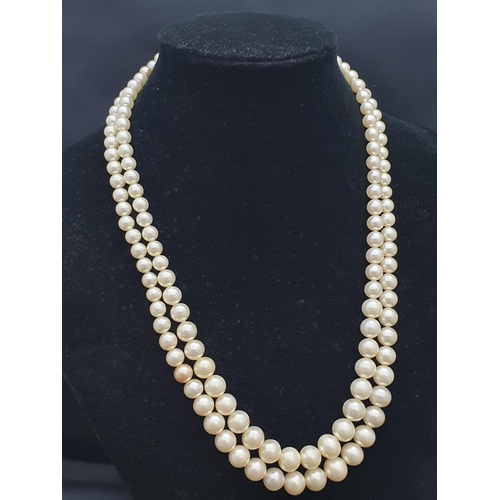 138 - A boxed Ciro double strand pearl necklace with silver clasp