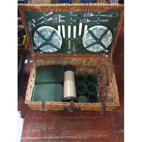 232 - A vintage Optima picnic basket and contents (looks to be complete), shipping unavailable