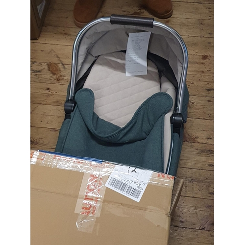 364 - A boxed Mama's and Papa's carry cot (unchecked), shipping unavailable