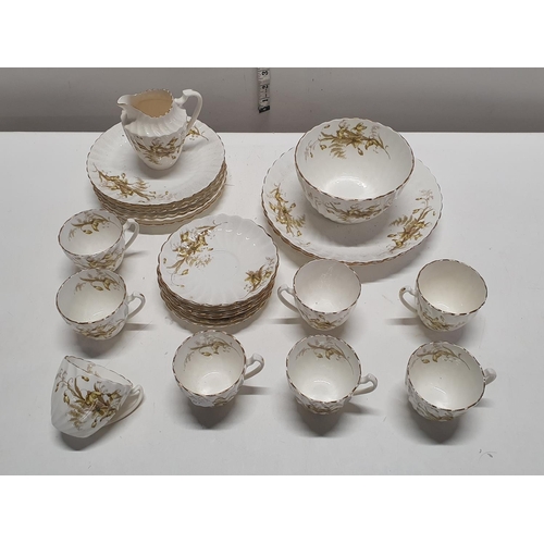 40 - A Edwardian bone china tea service by Chapman with gilt decoration, shipping unavailable