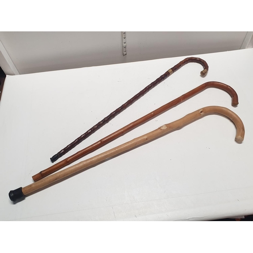 45 - Three assorted vintage walking sticks, shipping unavailable