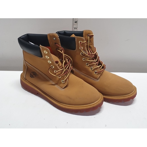 6 - A pair of Timberland boots size 11? (slight wear)