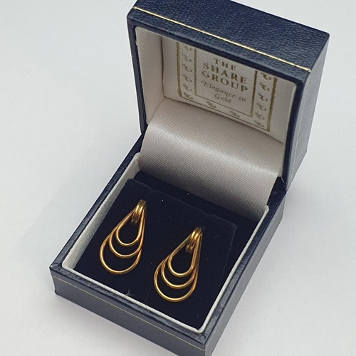 64 - A pair of vintage 9ct gold earrings. 2.18grams