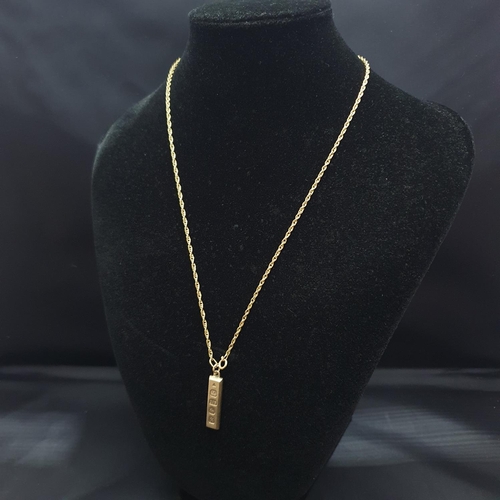 68 - A hallmarked 9ct gold ingot & chain. 8.30 grams