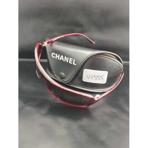 8 - A pair of original Chanel sunglasses in leather case