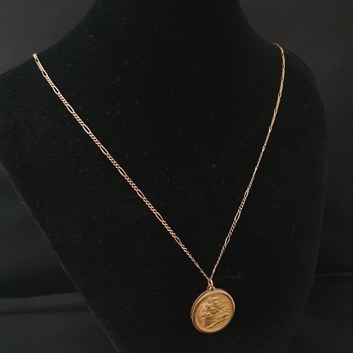 81 - A 1980 22ct gold full sovereign set in a 9ct gold mount & 9ct chain. Total weight 12.83 grams.