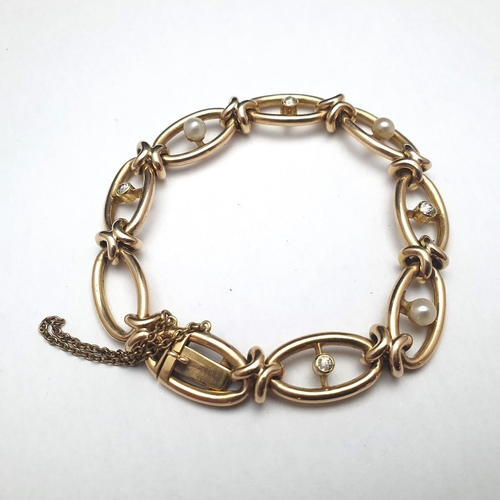 82 - A test for 14ct gold bracelet set with diamonds & pearls. 19.85 grams.