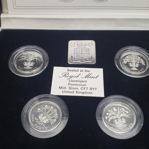 98 - A Royal Mint 1984-1987 United Kingdom £1 silver proof Piedfort collection